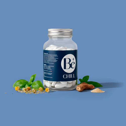 Be Chill supplement bottle with chamomile, basil, and botanical ingredients on a blue background